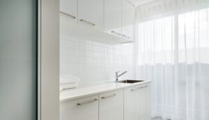 Luxury range laundry with premium cabinetry